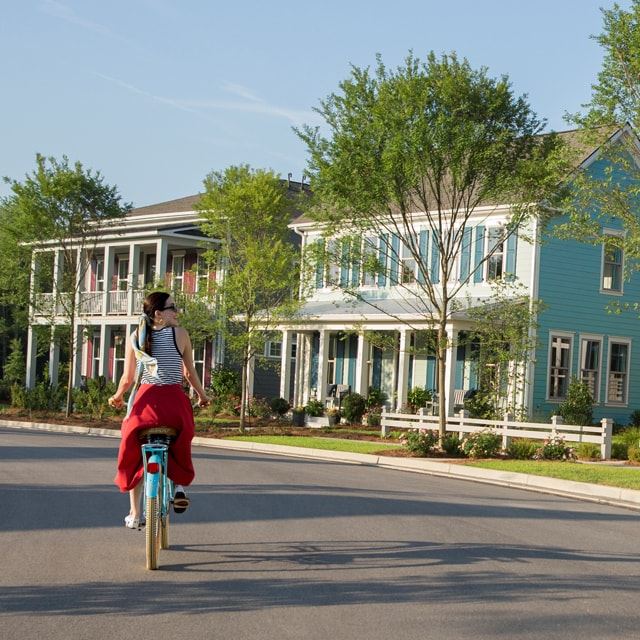 Bike riding on a Nexton street.