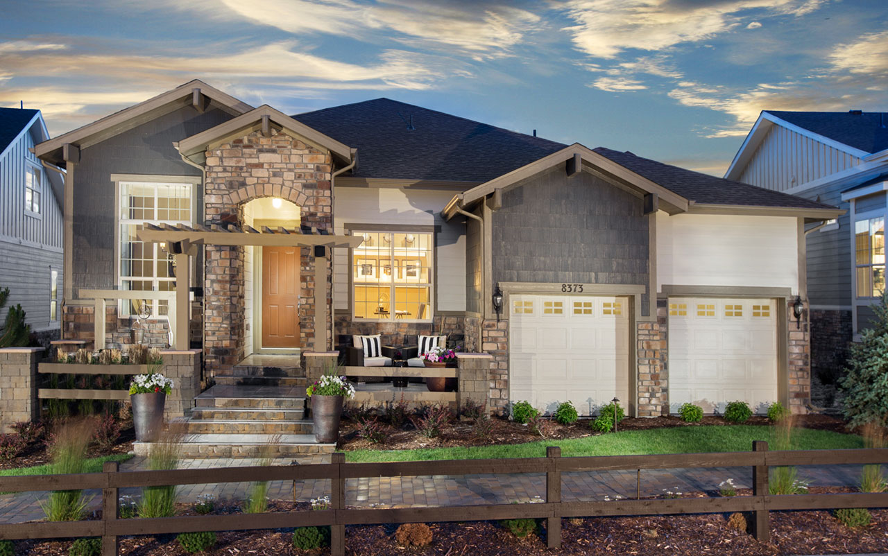 Model home at Inspiration community at dusk