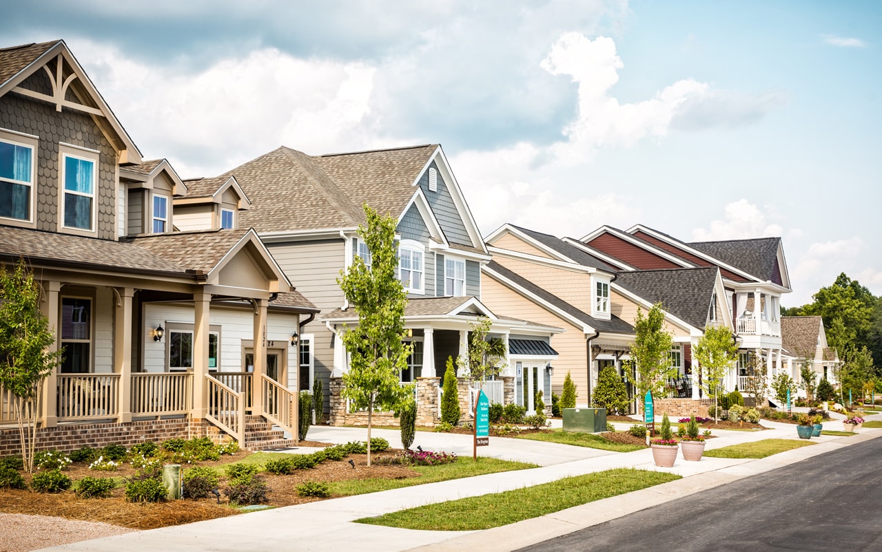 Row of model homes with covered front porches